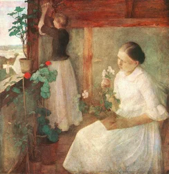 Niñas atendiendo a las flores